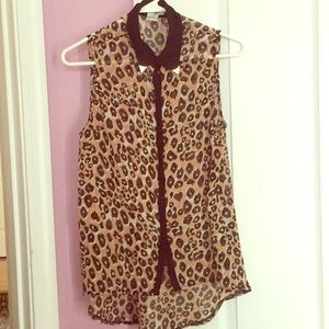 Cheetah print, chiffon, sleeveless button up.